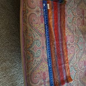 Stunning scarf 76 inches by 11 inches.